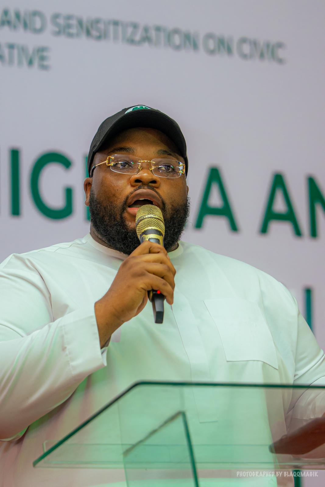 Speaker addressing students at Project New Nigeria event