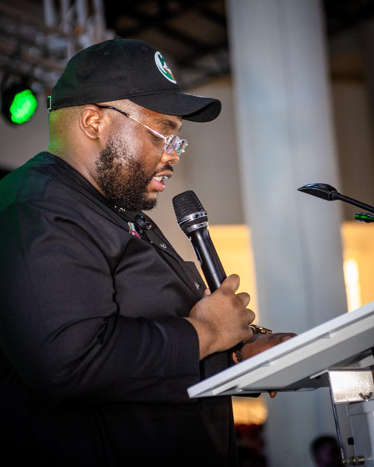 Founder Samuel Kaley Nzidee addressing an audience