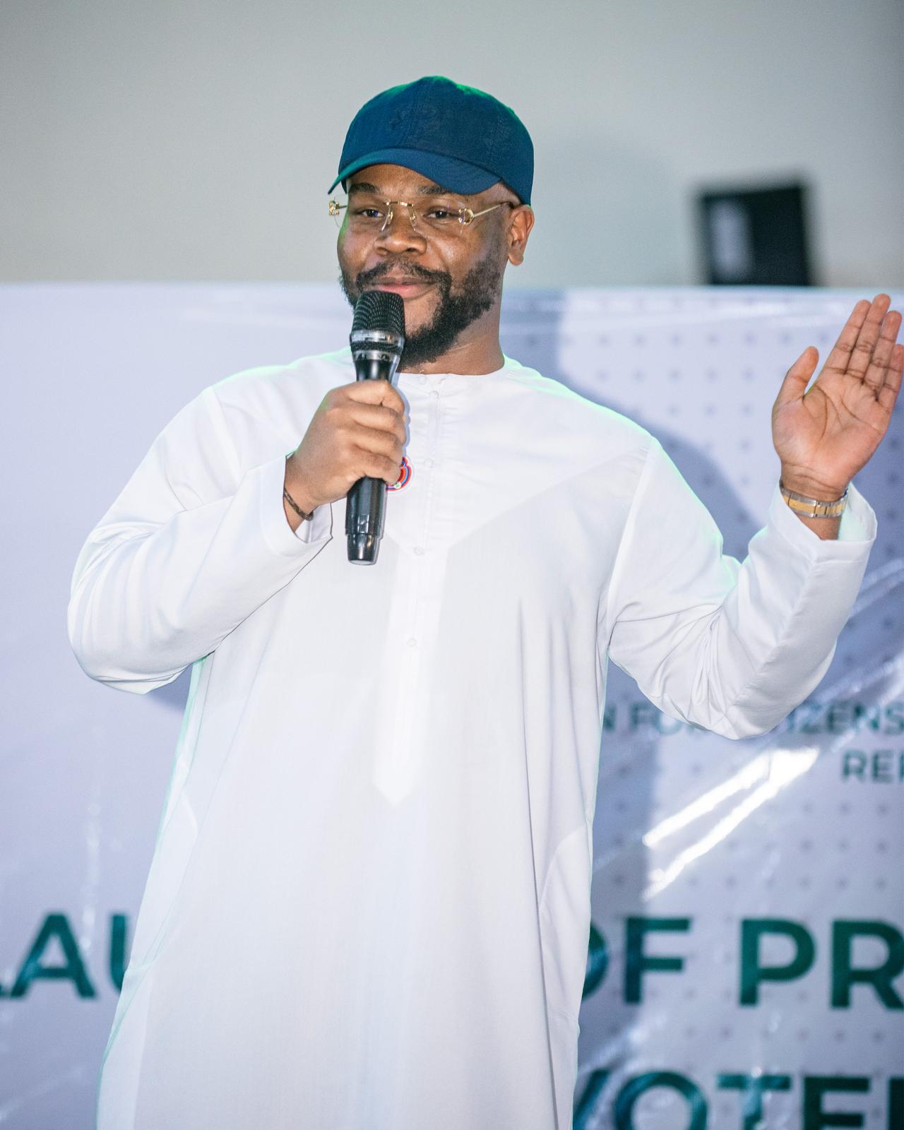 Speaker sharing remarks on stage